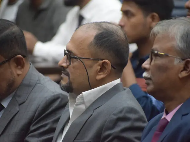 Audience members attending the department program.