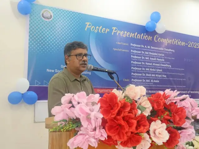 Faculty address during the poster presentation competition.