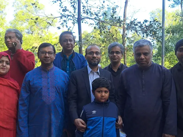 Outdoor gathering of alumni and community members.